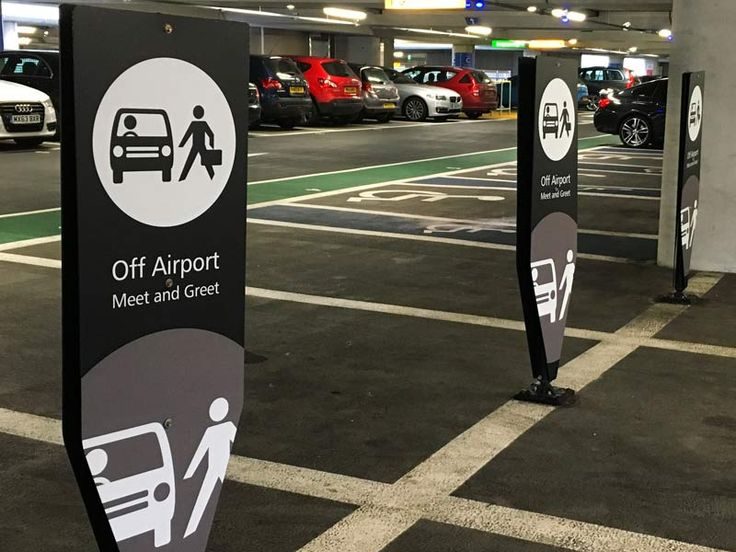 Meet and greet parking signage in a covered car park at East Midlands Airport